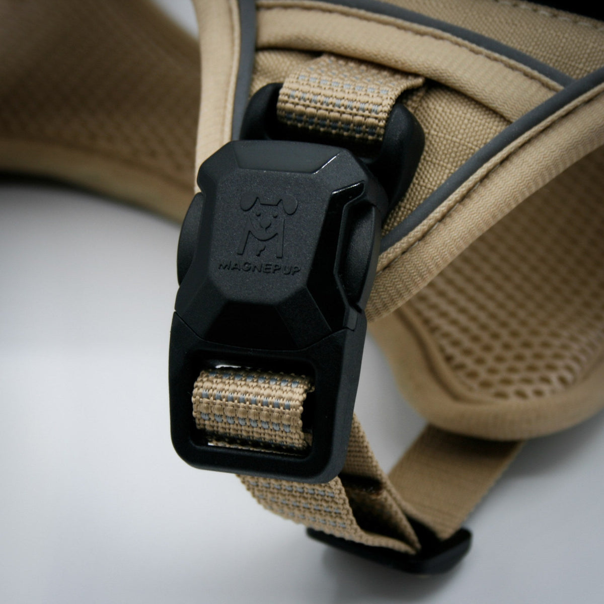 Desert Tan harness magnetic buckle close-up